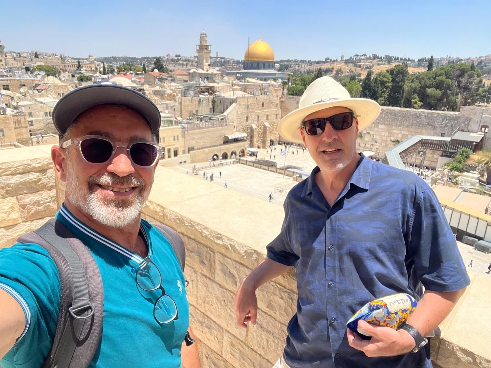 Ephraim with a guest above the Western Wall
